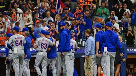 Mets ride wave of emotional final day to take down Brewers in.